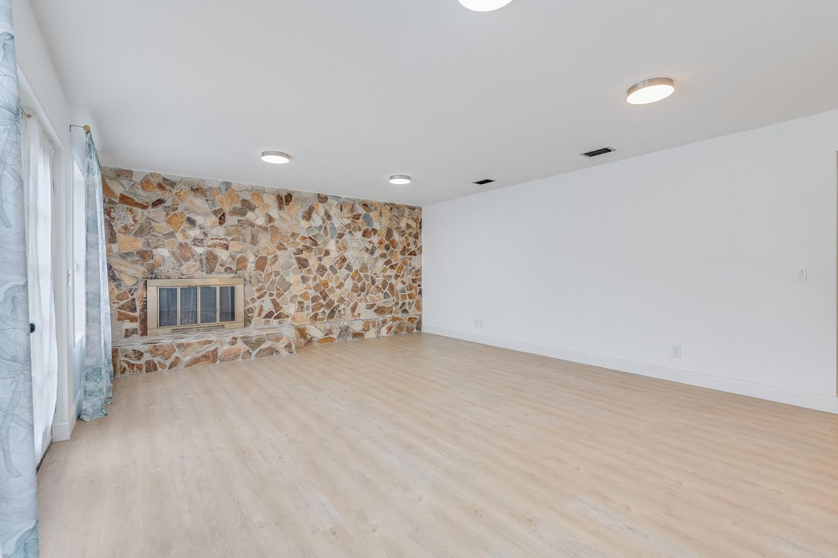 Empty room, Fireplace, Interior, Recessed Lighting, Wood Texture Flooring
