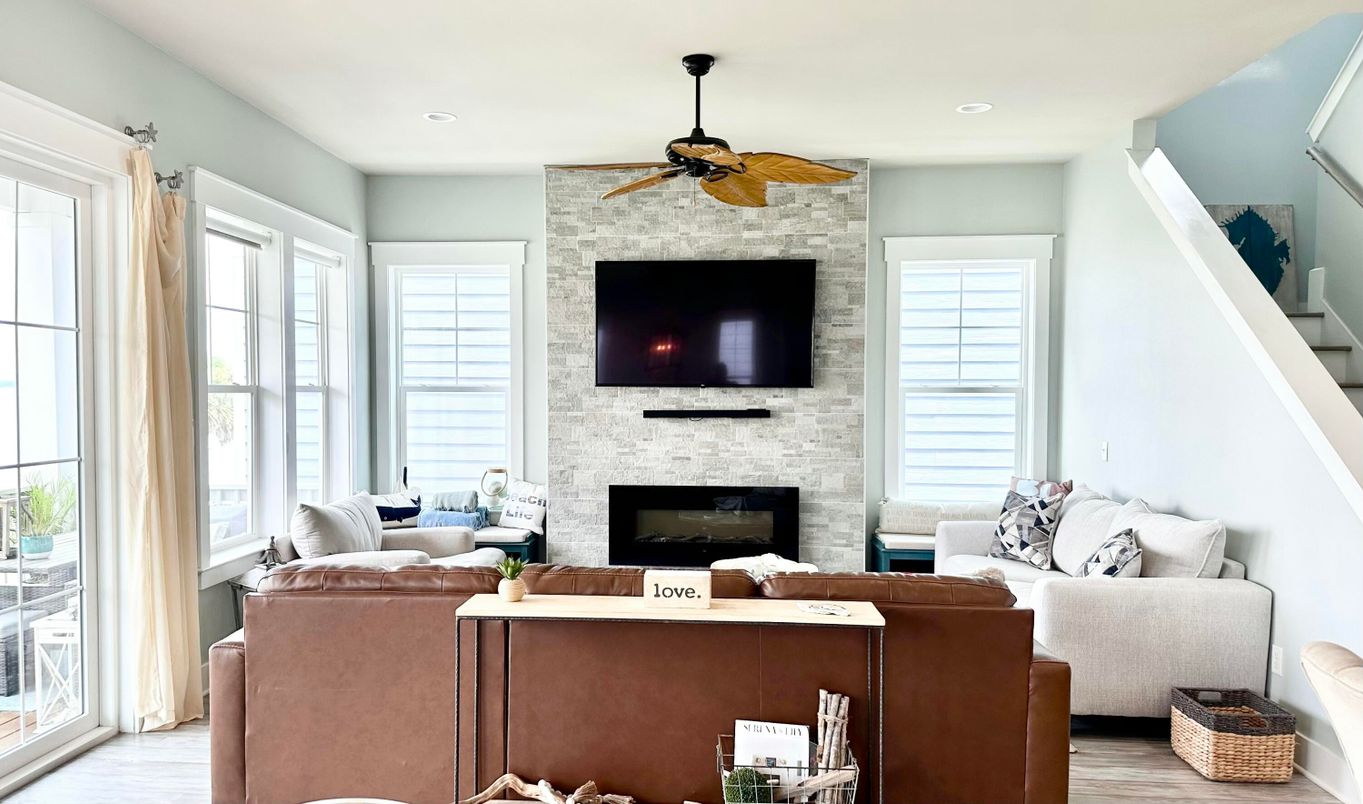 Fireplace, Interior, Living room, Recessed Lighting, Stone Walls, Wood Texture Flooring