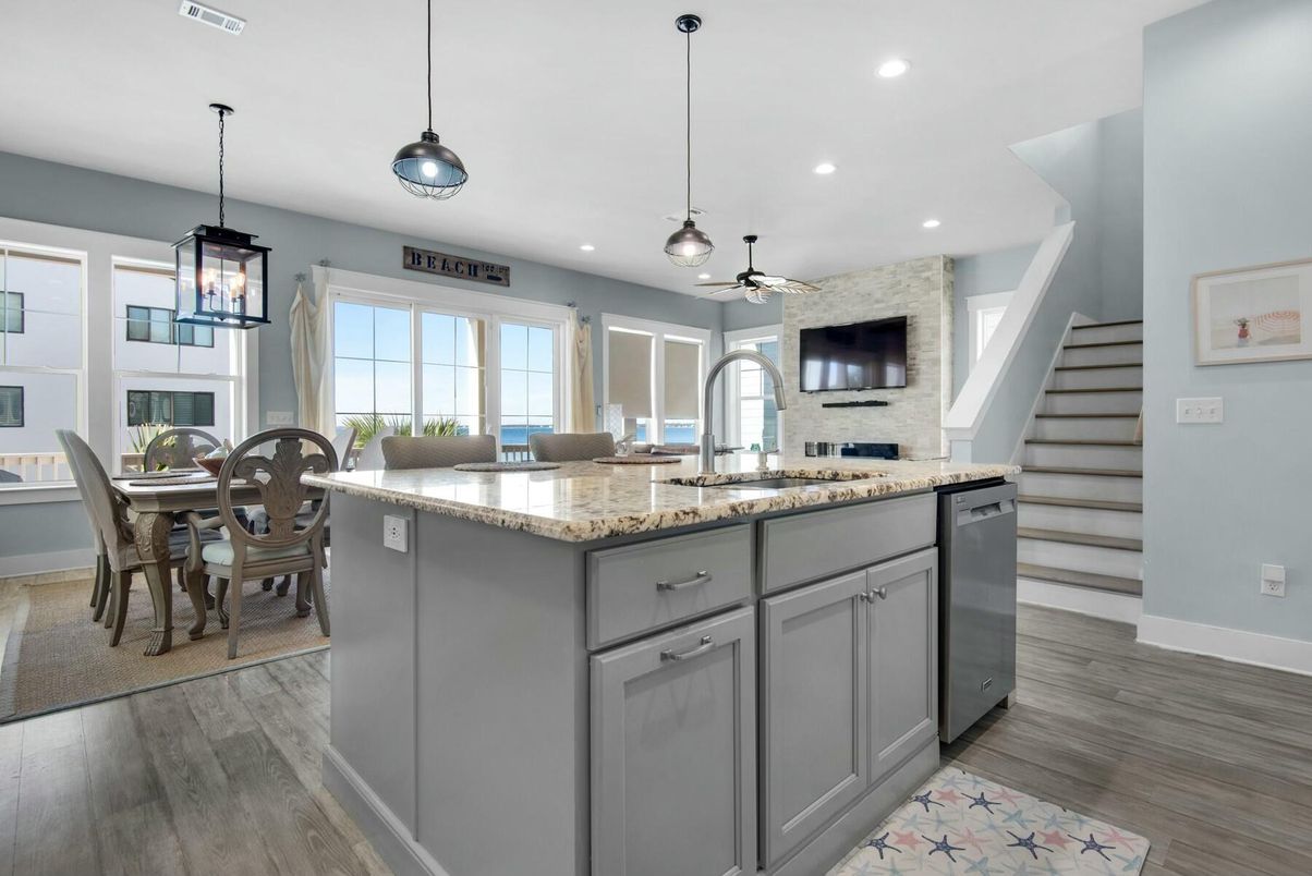 Dining room, Interior, Kitchen, Pendant Lights, Recessed Lighting, Stainless Steel Appliances, Wood Texture Flooring