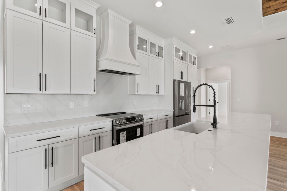 Interior, Kitchen, Marble Walls, Recessed Lighting, Stainless Steel Appliances, Wood Texture Flooring