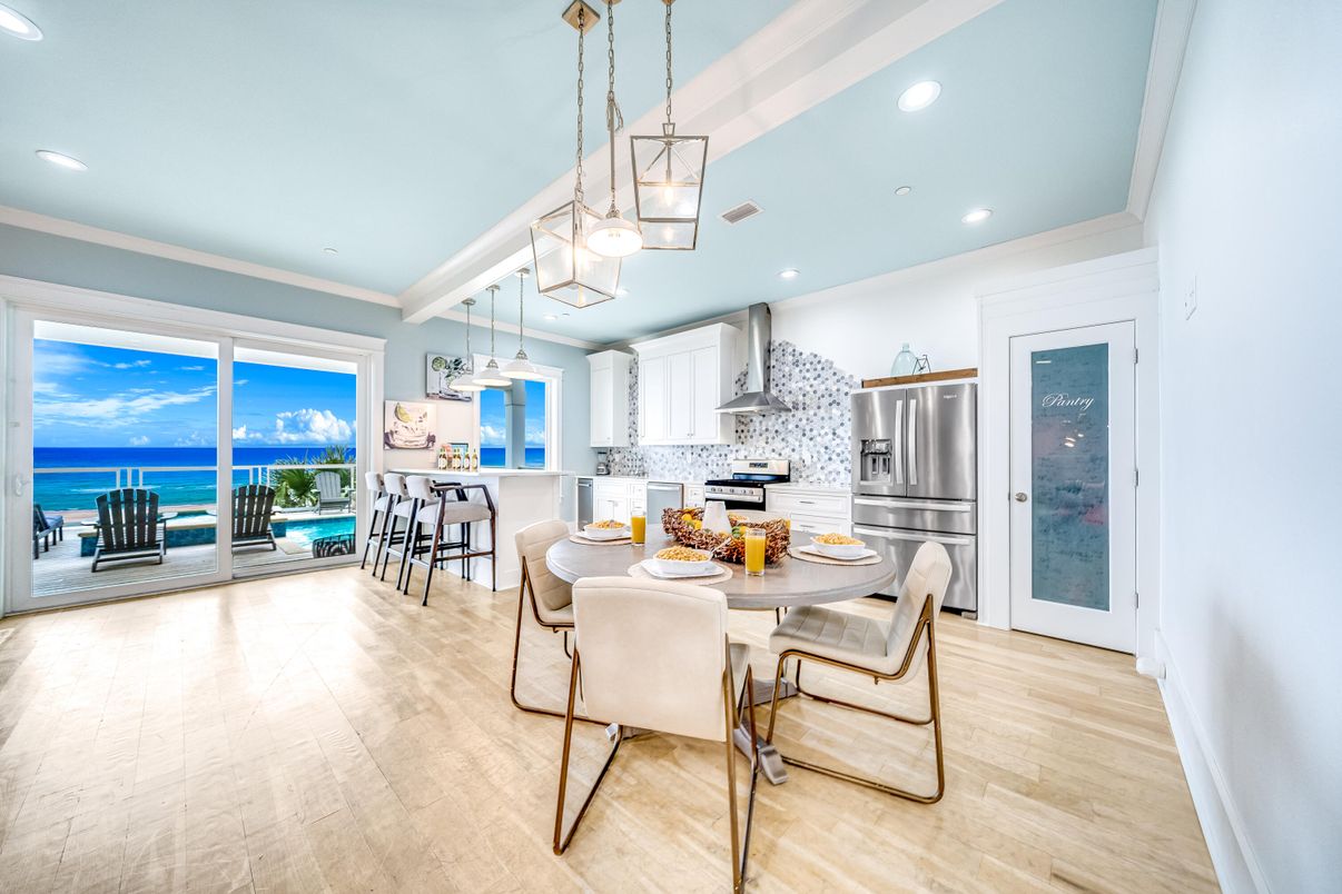 Dining room, Interior, Kitchen, Pendant Lights, Recessed Lighting, Stainless Steel Appliances, Water, Wood Texture Flooring