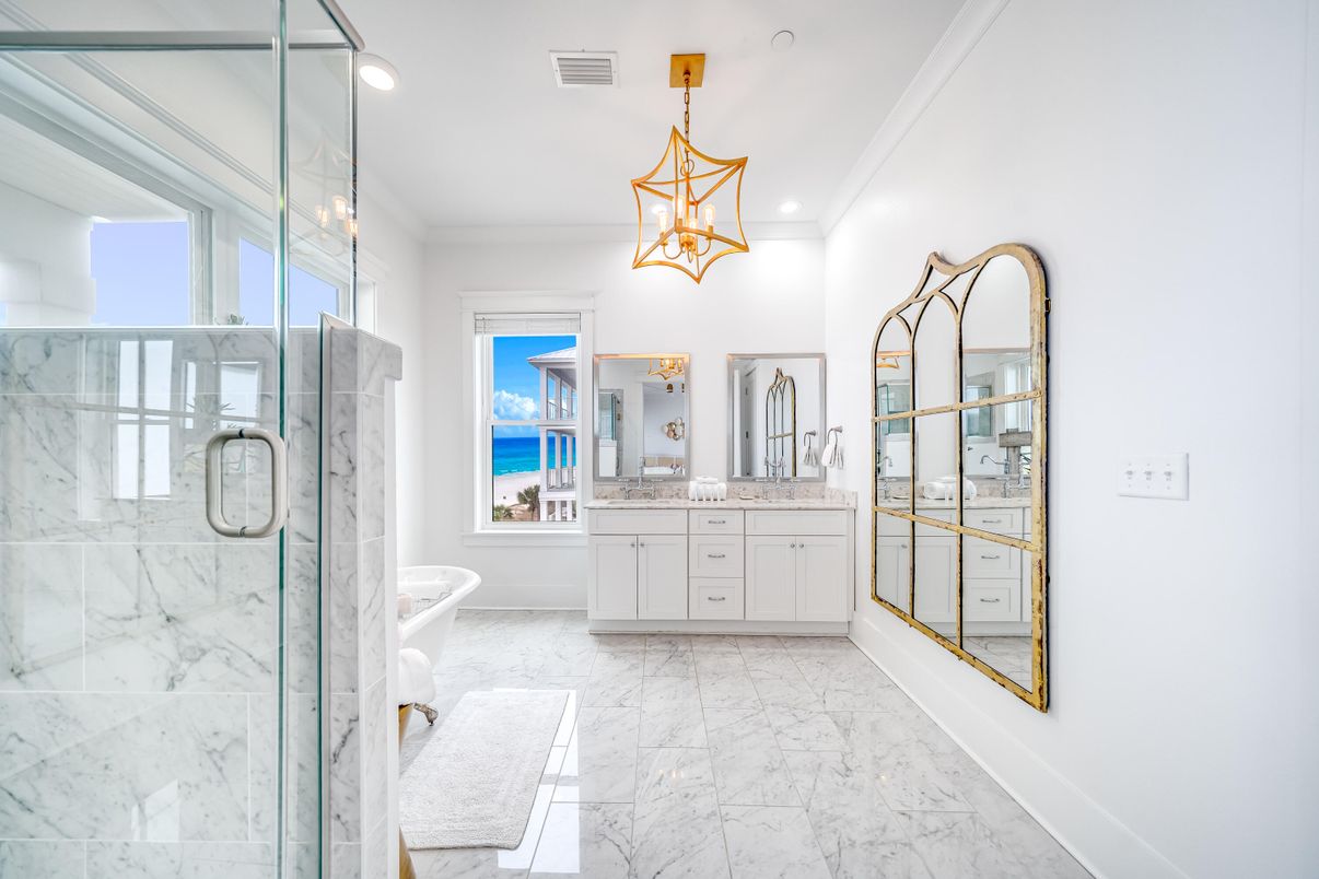Bathroom, Dual Sink Vanities, Glass Shower, Interior, Marble, Marble Walls, Pendant Lights, Recessed Lighting