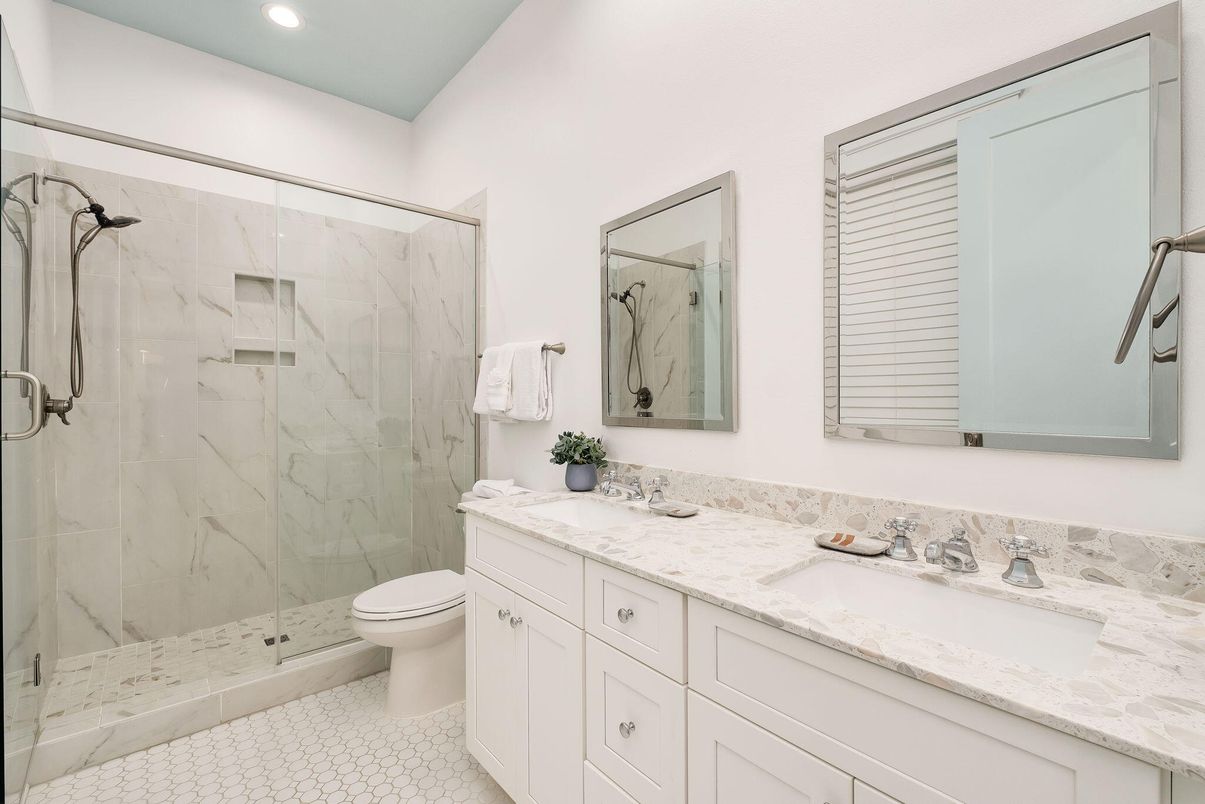 Bathroom, Dual Sink Vanities, Glass Shower, Interior, Marble Walls, Recessed Lighting