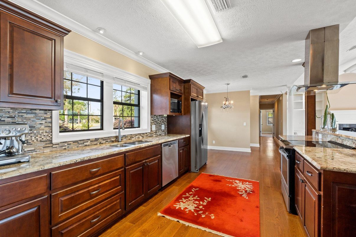 Chandelier, Interior, Kitchen, Pendant Lights, Recessed Lighting, Stainless Steel Appliances, Wood Texture Flooring