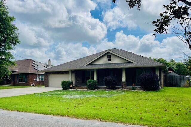 Attached, Backyard, Exterior, Facade, Brick Facade, Ranch