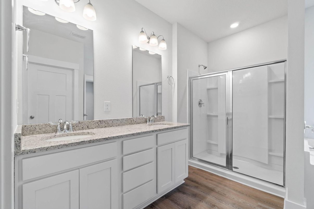 Bathroom, Dual Sink Vanities, Glass Shower, Interior, Recessed Lighting, Wood Texture Flooring