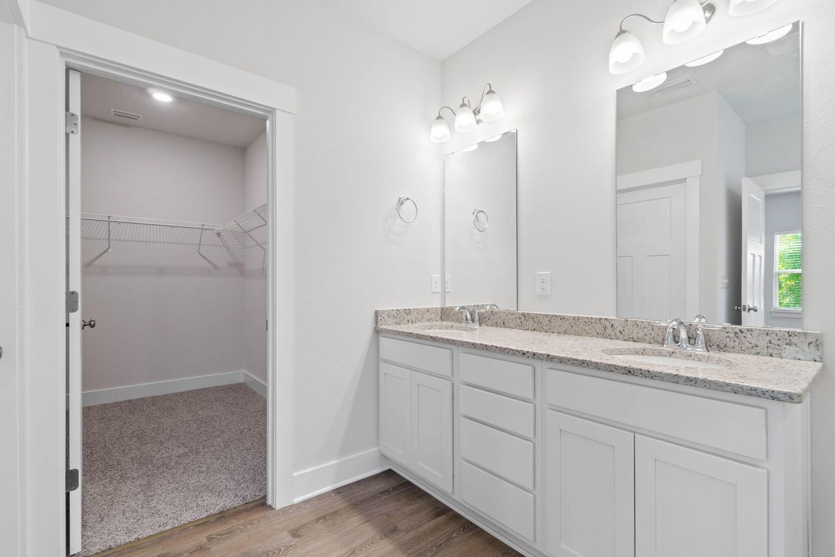 Bathroom, Dual Sink Vanities, Interior, Recessed Lighting, Walk-in Closets, Wood Texture Flooring