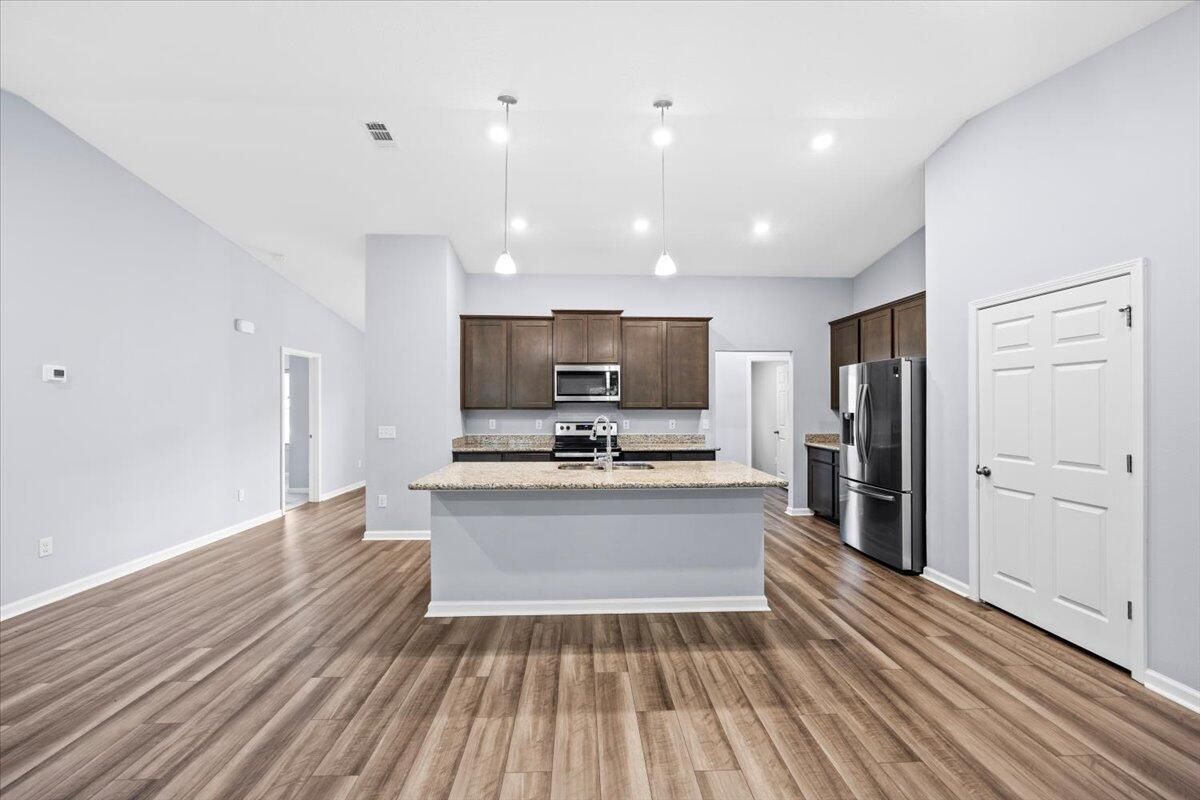 Interior, Kitchen, Pendant Lights, Recessed Lighting, Stainless Steel Appliances, Wood Texture Flooring
