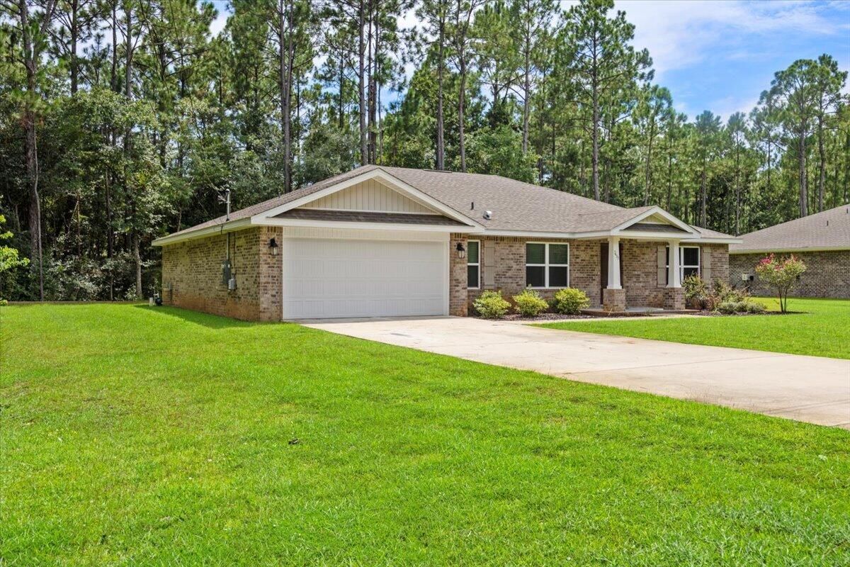 Attached, Backyard, Exterior, Facade, Brick Facade, Ranch