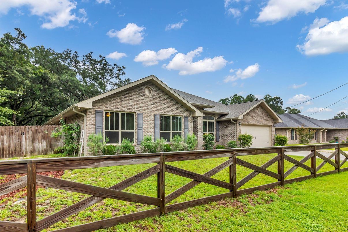 Attached, Backyard, Exterior, Facade, Brick Facade, Ranch