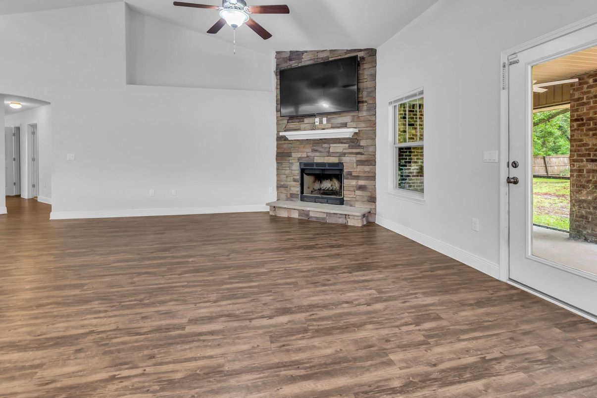 Empty room, Fireplace, Interior, Stone Walls, Wood Texture Flooring