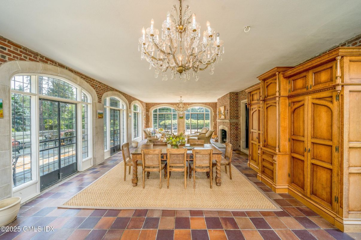 Chandelier, Dining room, Fireplace, Interior, Stone Walls