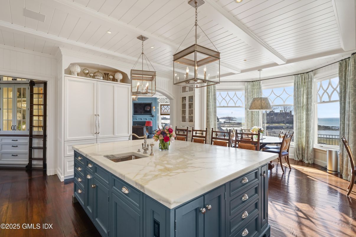 Dining room, Interior, Kitchen, Pendant Lights, Recessed Lighting, Stainless Steel Appliances, Water, Wood Texture Flooring