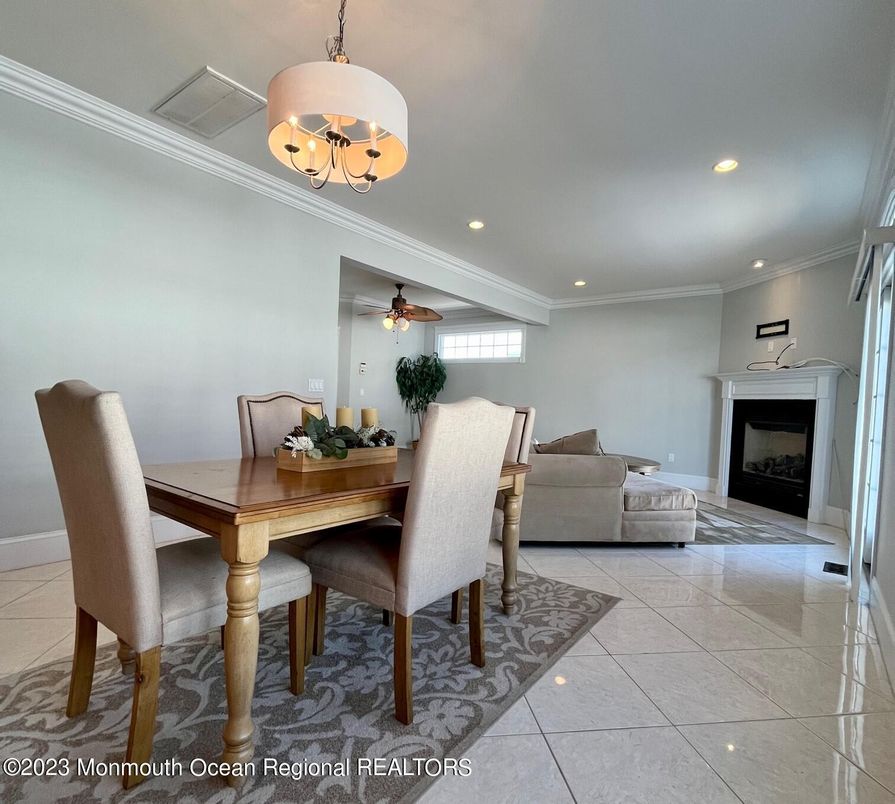 Chandelier, Dining room, Fireplace, Interior, Recessed Lighting