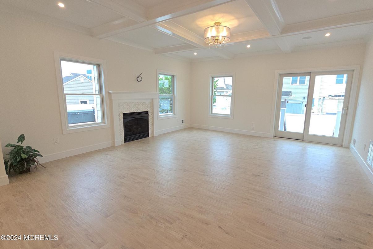 Empty room, Fireplace, Interior, Recessed Lighting, Wood Texture Flooring