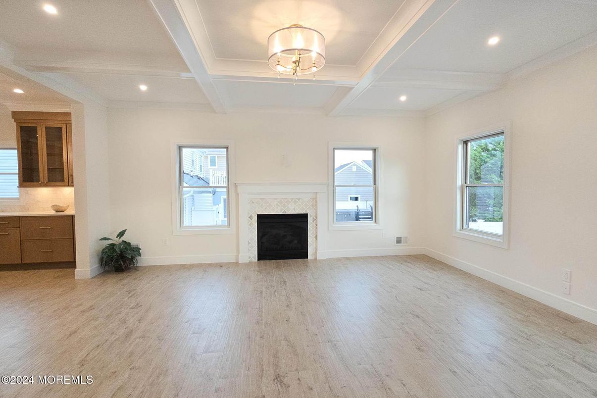 Empty room, Fireplace, Interior, Recessed Lighting, Wood Texture Flooring