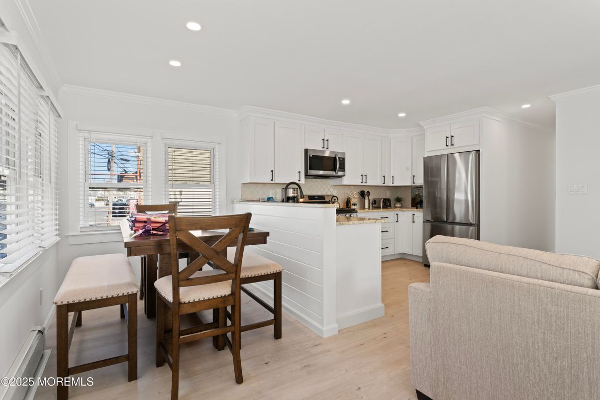 Dining room, Interior, Kitchen, Recessed Lighting, Stainless Steel Appliances, Wood Texture Flooring