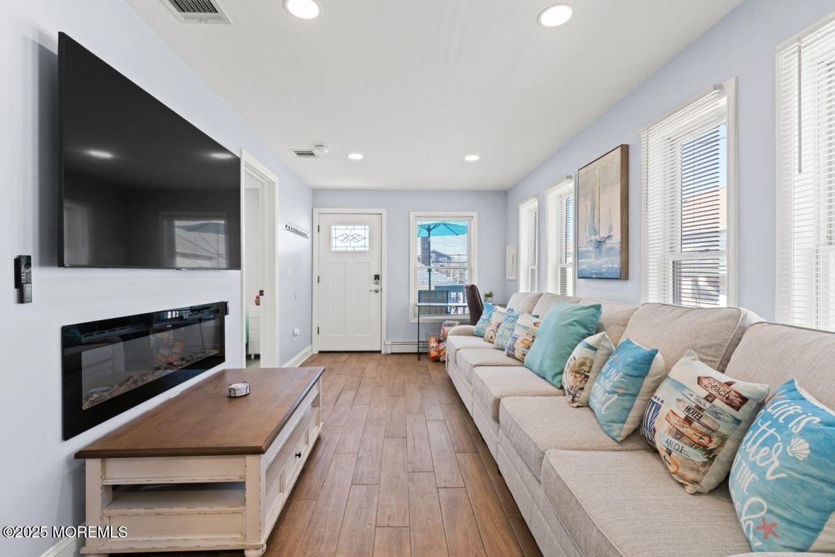 Fireplace, Interior, Living room, Recessed Lighting, Wood Texture Flooring
