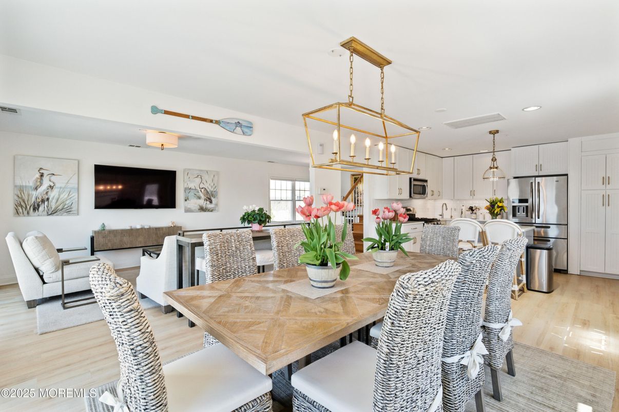 Dining room, Interior, Kitchen, Living room, Pendant Lights, Recessed Lighting, Stainless Steel Appliances, Wood Texture Flooring