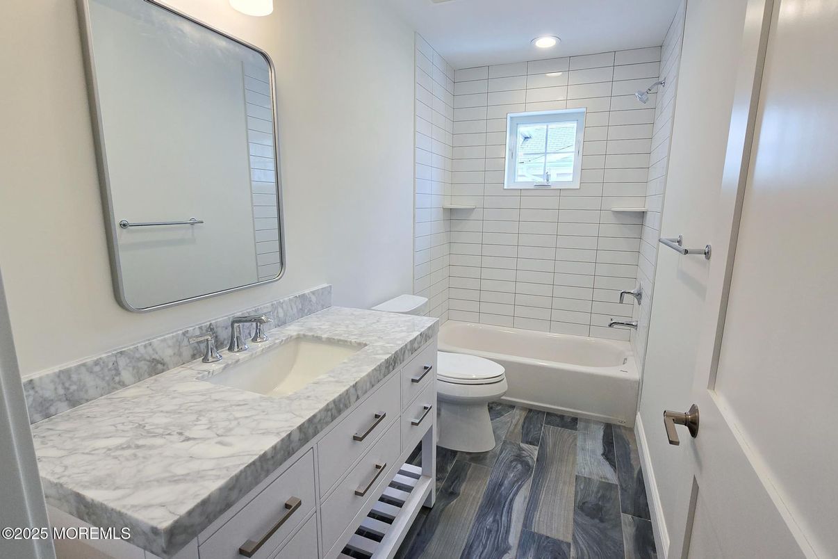 Bathroom, Dual Sink Vanities, Interior, Recessed Lighting, Wood Texture Flooring