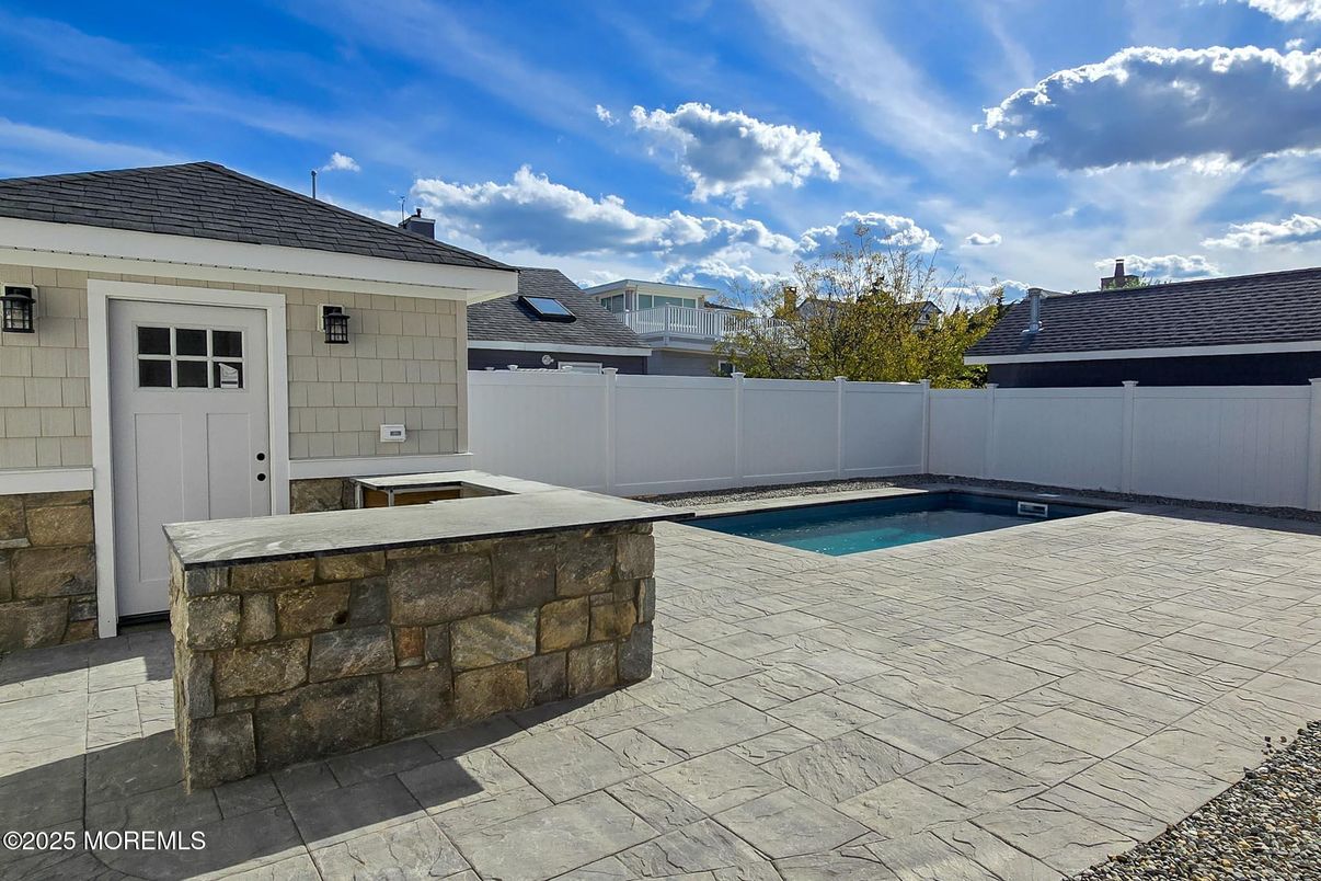 Exterior, Pool, Solar Panels