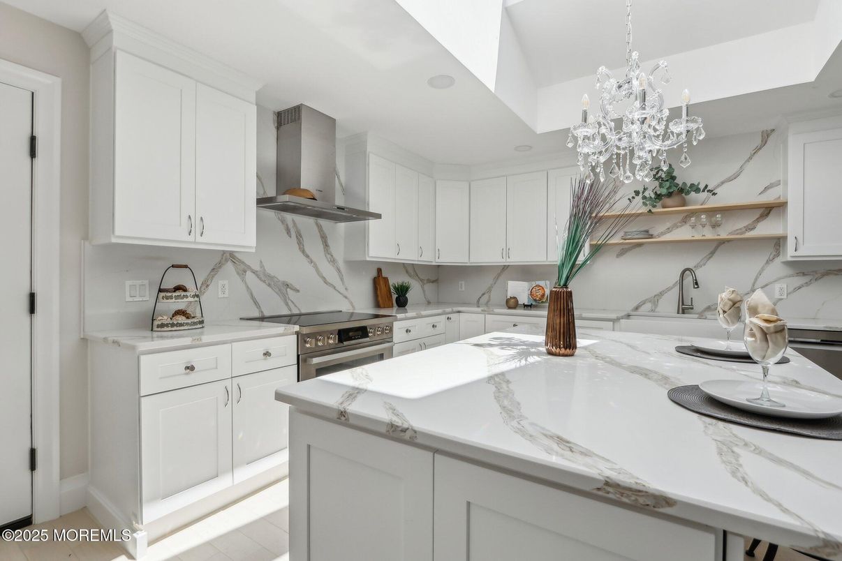 Chandelier, Interior, Kitchen, Marble Walls, Recessed Lighting, Stainless Steel Appliances