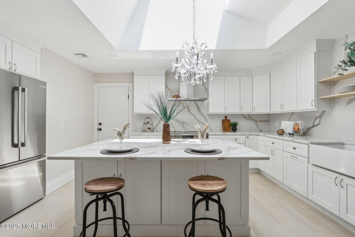 Chandelier, Interior, Kitchen, Marble Walls, Recessed Lighting, Wood Texture Flooring