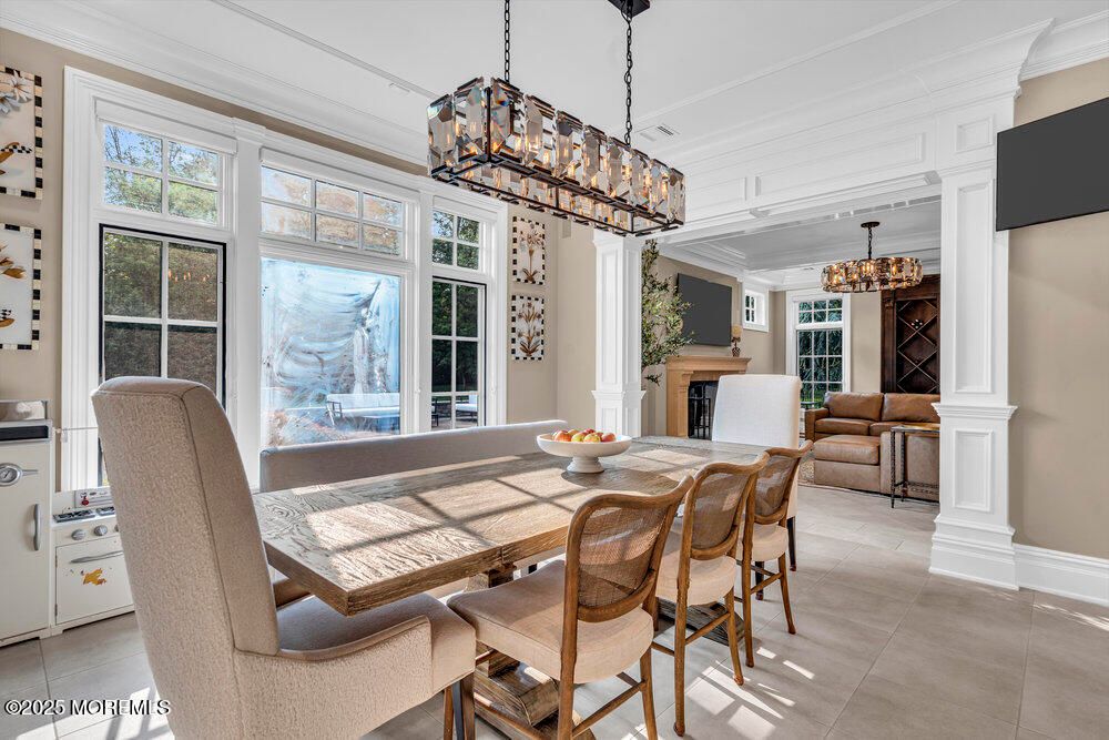 Chandelier, Dining room, Fireplace, Interior, Pendant Lights