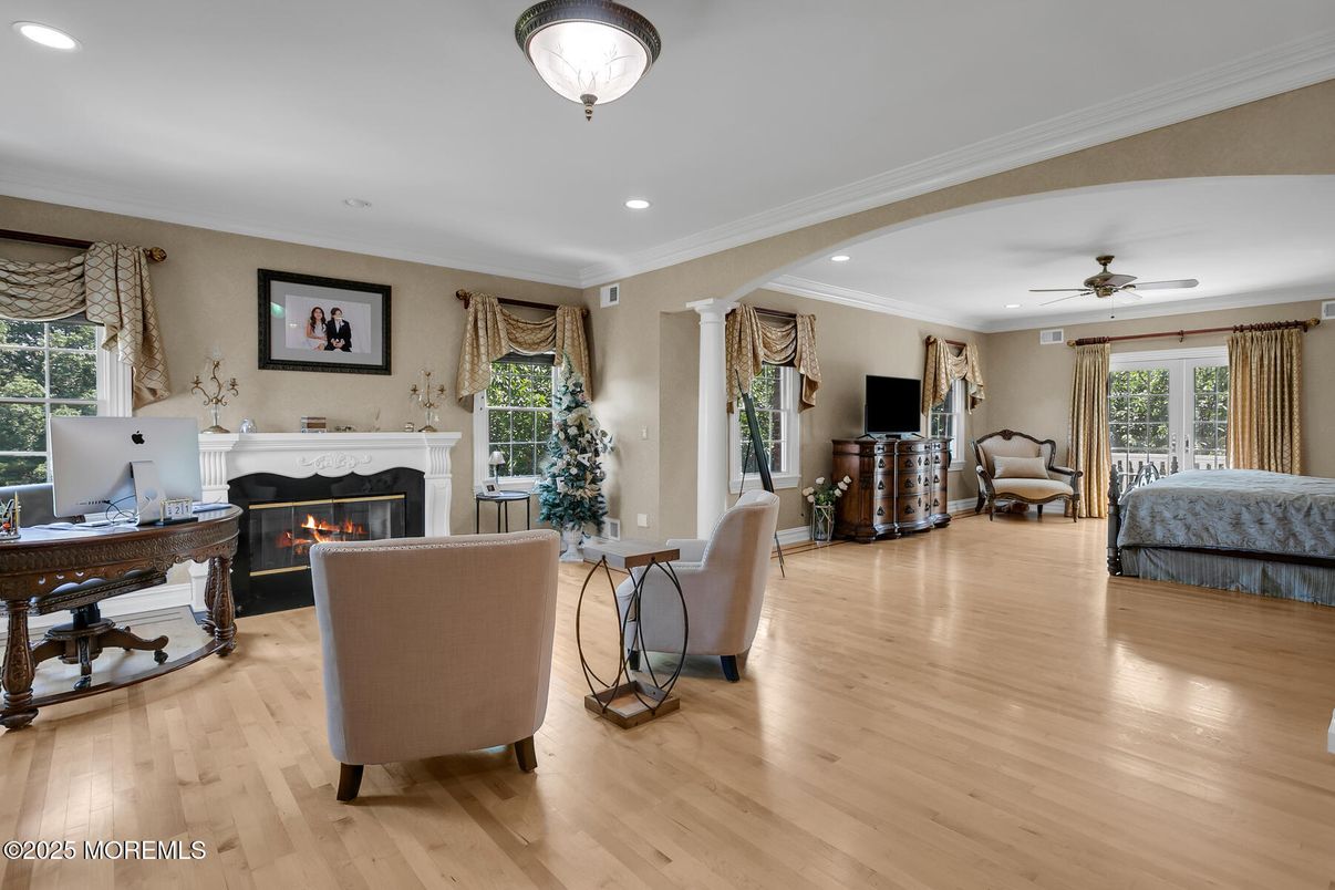 Dining room, Fireplace, Interior, Living room, Recessed Lighting, Wood Texture Flooring
