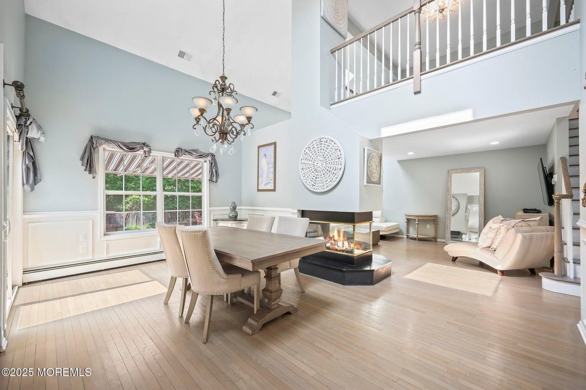 Chandelier, Dining room, Fireplace, Interior, Recessed Lighting, Wood Texture Flooring