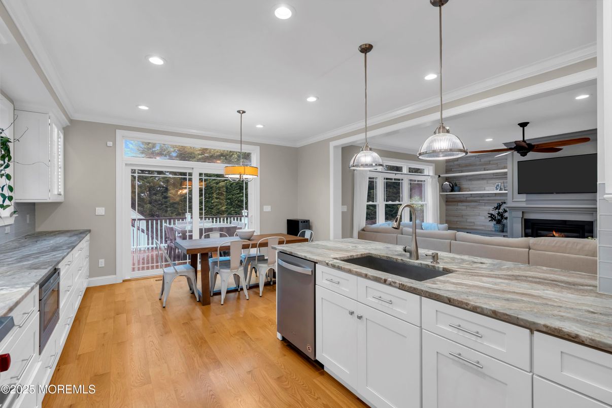 Dining room, Fireplace, Interior, Kitchen, Living room, Pendant Lights, Recessed Lighting, Wood Texture Flooring