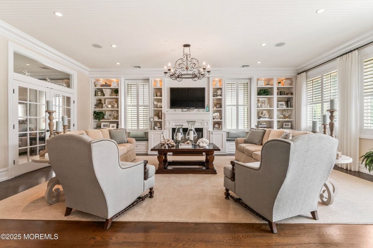 Chandelier, Fireplace, Interior, Living room, Recessed Lighting, Wood Texture Flooring