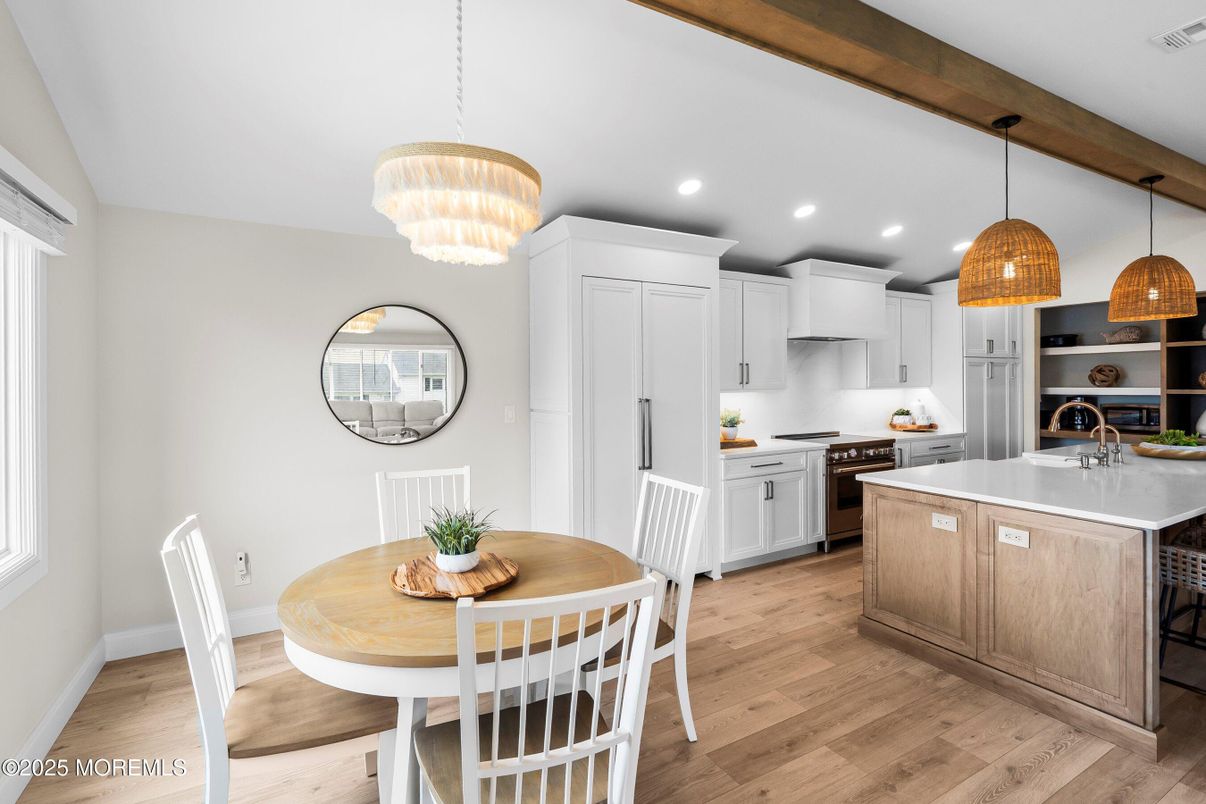 Chandelier, Dining room, Interior, Kitchen, Pendant Lights, Recessed Lighting, Stainless Steel Appliances, Wood Texture Flooring