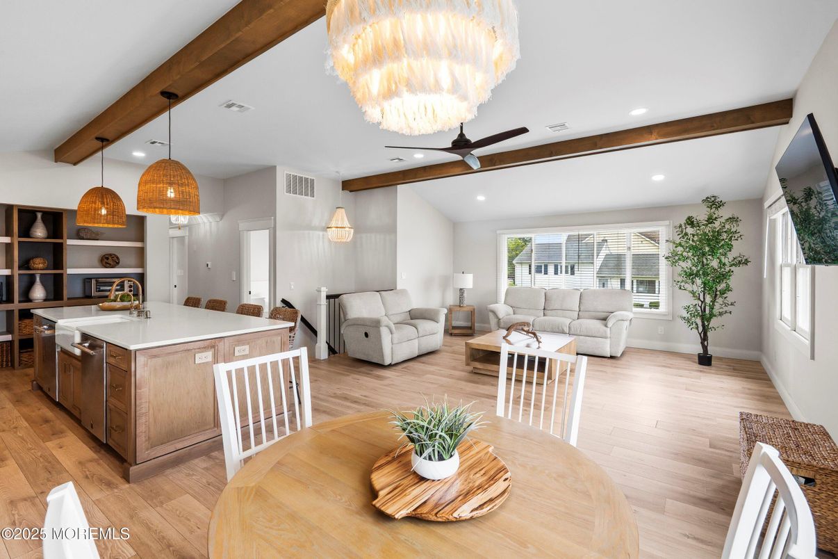 Chandelier, Dining room, Interior, Kitchen, Living room, Pendant Lights, Recessed Lighting, Wooden Beams, Wood Texture Flooring
