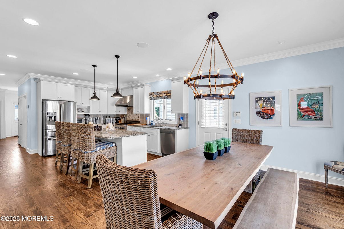 Dining room, Interior, Kitchen, Pendant Lights, Recessed Lighting, Stainless Steel Appliances, Wood Texture Flooring