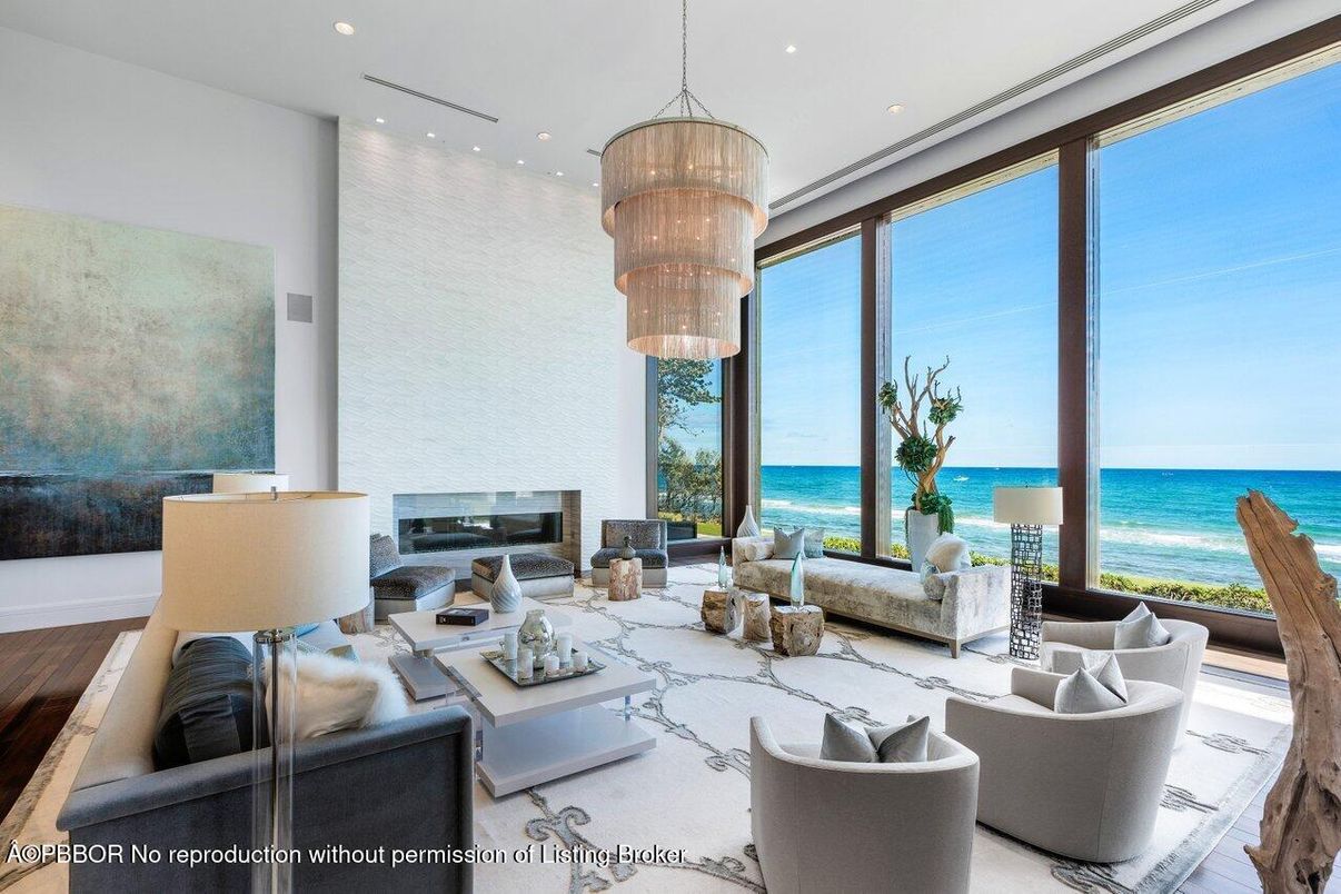 Chandelier, Fireplace, Interior, Living room, Recessed Lighting, Water, Wood Texture Flooring