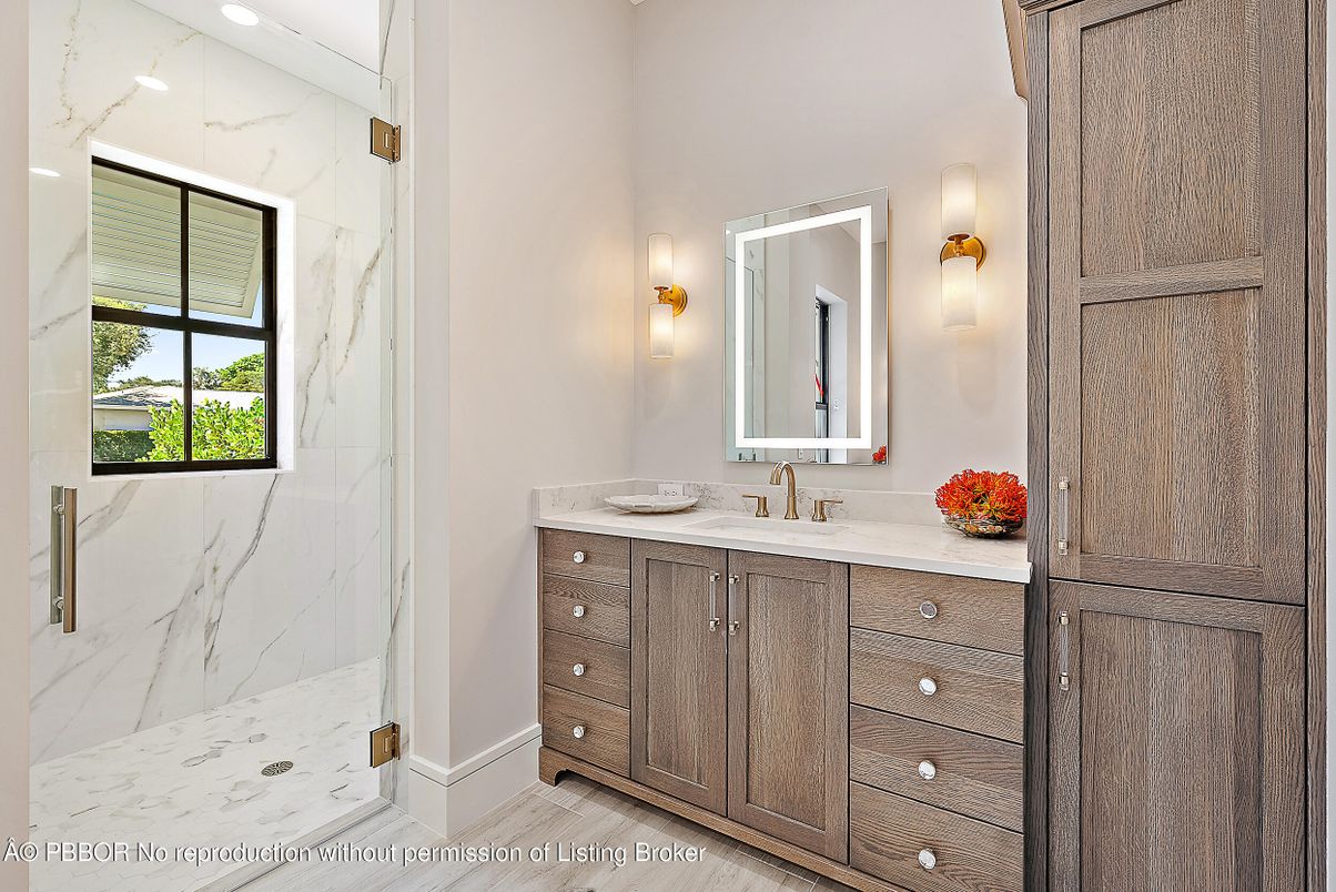 Bathroom, Dual Sink Vanities, Glass Shower, Interior, Marble, Marble Walls, Recessed Lighting