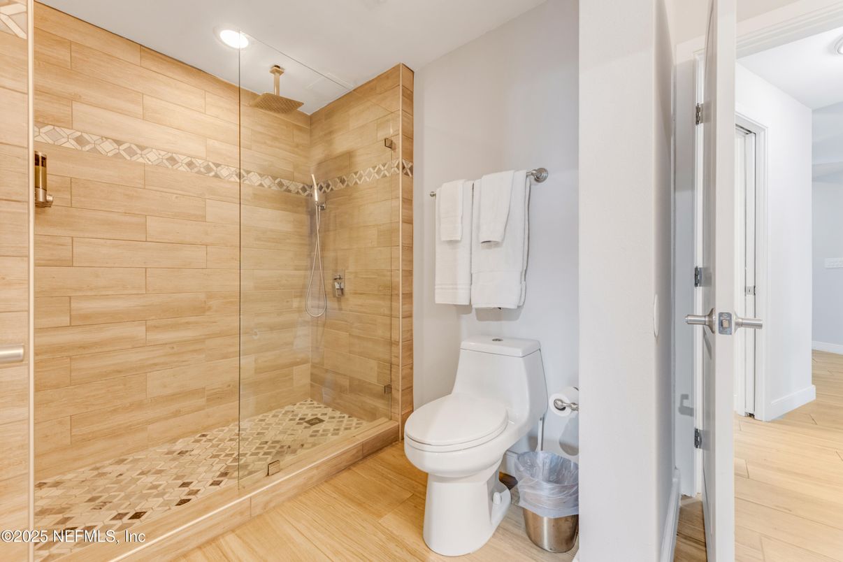 Bathroom, Glass Shower, Interior, Recessed Lighting, Wood Texture Flooring, Wooden Walls
