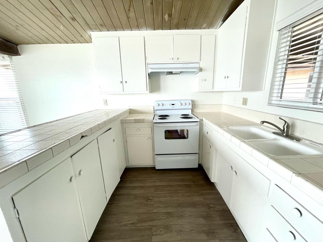 Interior, Kitchen, Tile Countertops, Wooden Ceilings, Wood Texture Flooring