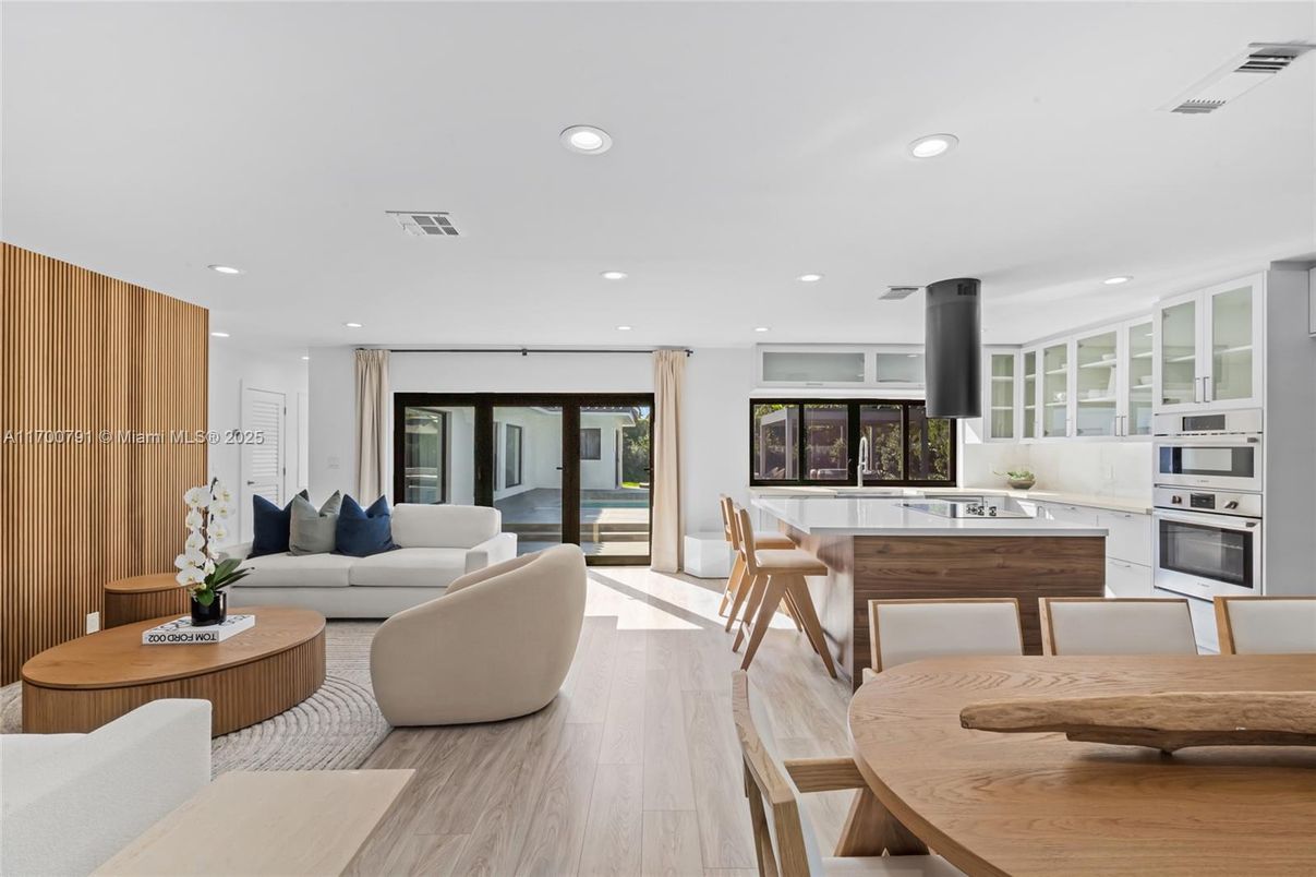 Dining room, Interior, Kitchen, Living room, Recessed Lighting, Stainless Steel Appliances, Wood Texture Flooring