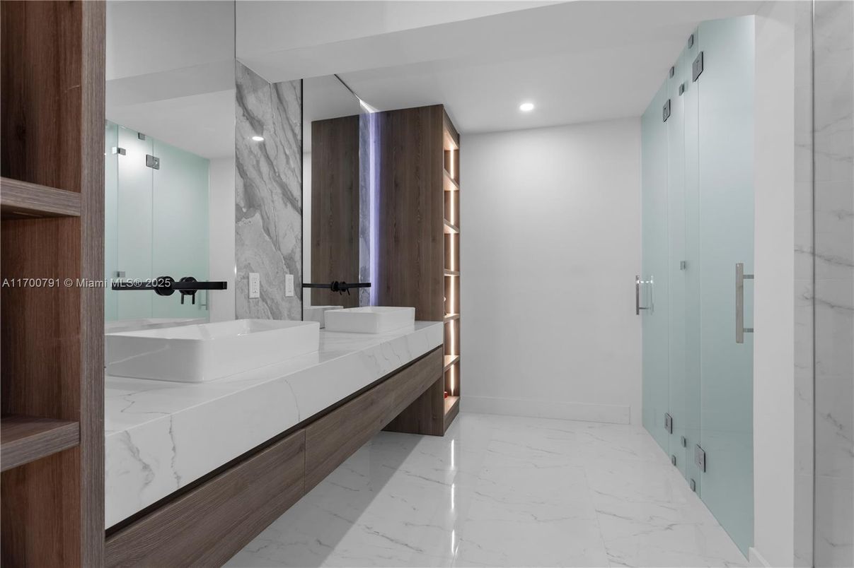 Bathroom, Dual Sink Vanities, Glass Shower, Interior, Marble, Marble Walls, Recessed Lighting