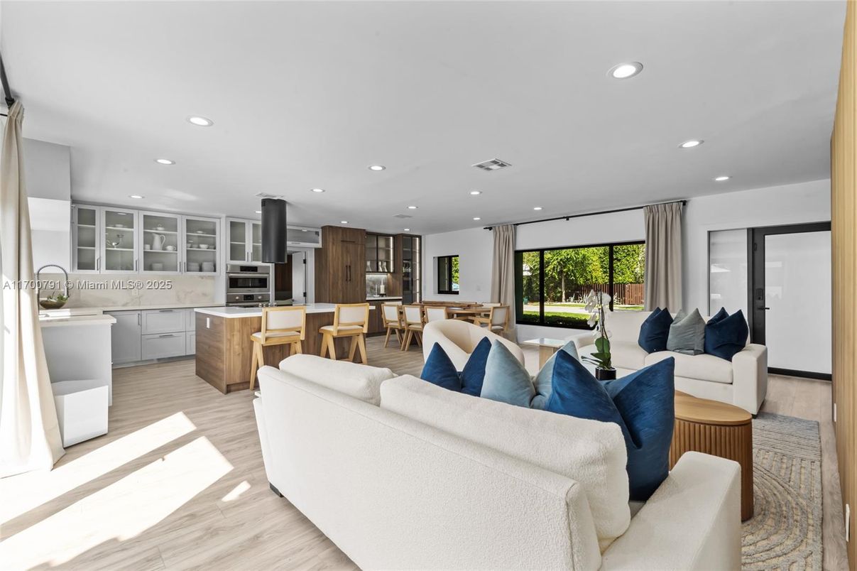 Dining room, Interior, Kitchen, Living room, Recessed Lighting, Stainless Steel Appliances, Wood Texture Flooring