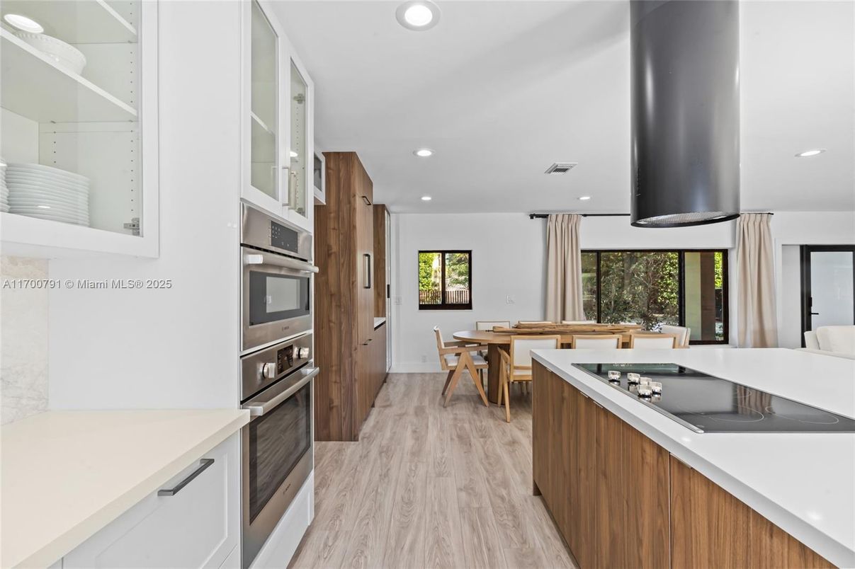 Dining room, Interior, Kitchen, Recessed Lighting, Stainless Steel Appliances, Wood Texture Flooring