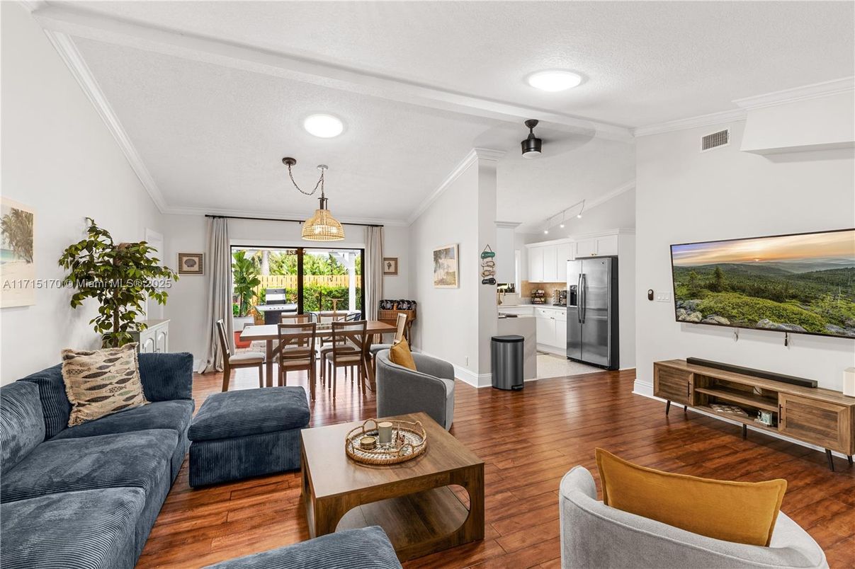 Dining room, Interior, Kitchen, Living room, Pendant Lights, Recessed Lighting, Stainless Steel Appliances, Wood Texture Flooring