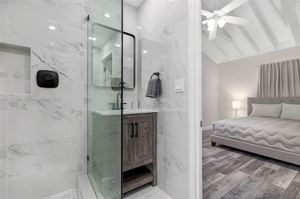 Bathroom, Bedroom, Glass Shower, Interior, Marble Walls, Recessed Lighting, Wood Texture Flooring