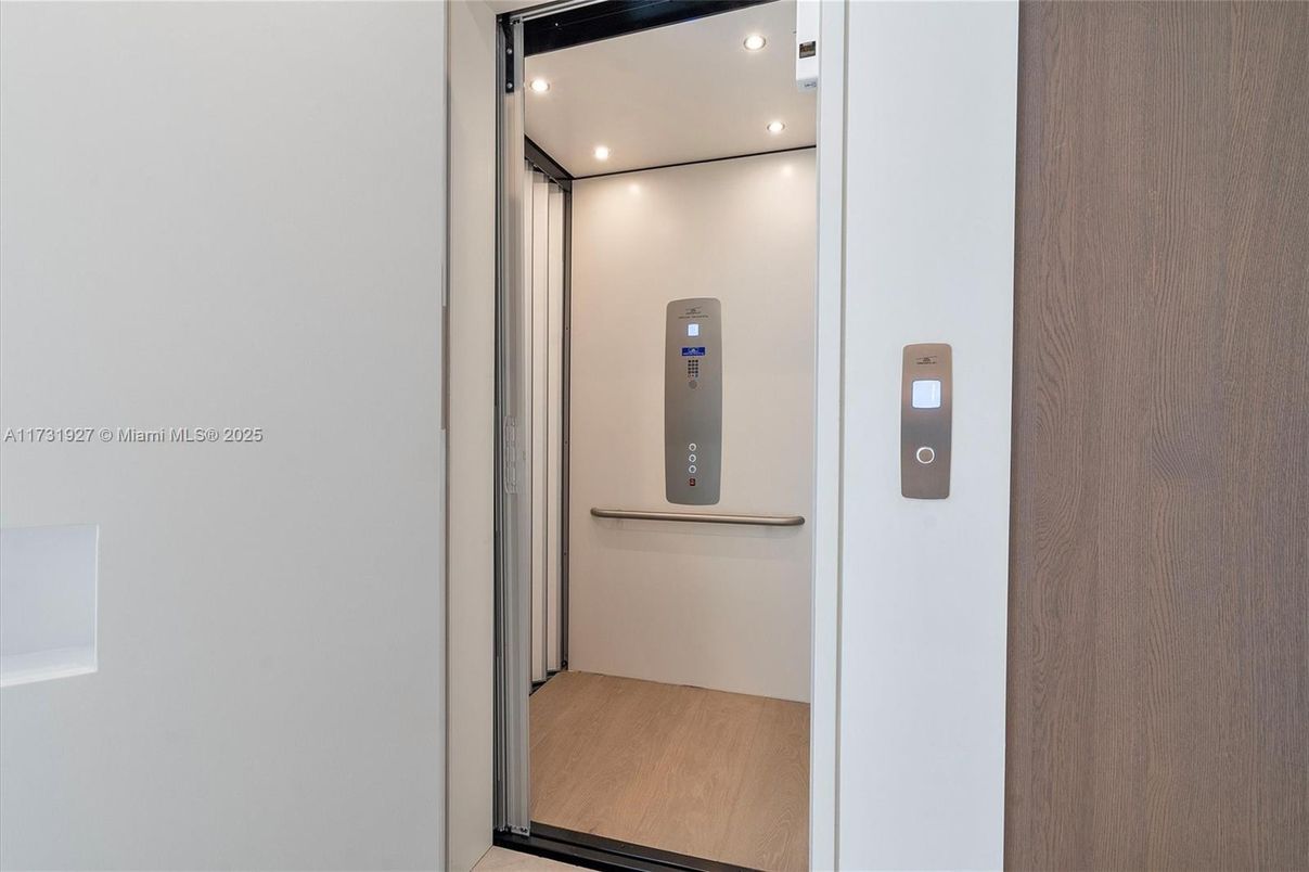 Elevator, Interior, Recessed Lighting, Wood Texture Flooring