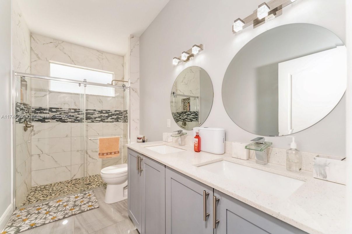 Bathroom, Dual Sink Vanities, Glass Shower, Interior, Marble Walls