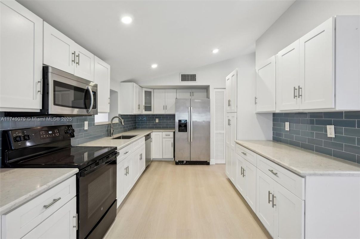 Interior, Kitchen, Recessed Lighting, Stainless Steel Appliances, Wood Texture Flooring