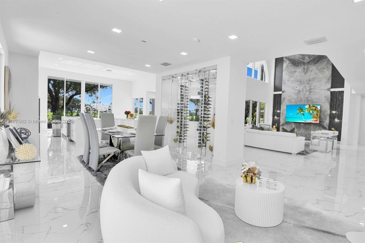 Dining room, Fireplace, Interior, Living room, Marble, Recessed Lighting, Wine Storage