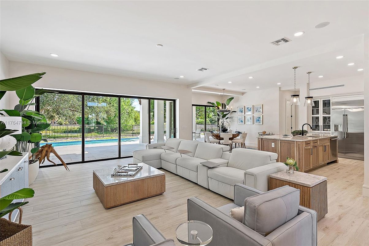 Dining room, Interior, Kitchen, Living room, Pendant Lights, Recessed Lighting, Stainless Steel Appliances, Wood Texture Flooring